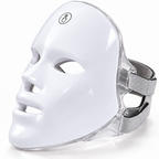 Angled front view of the Red Light Therapy Mask showing its white shell, touch-control symbol, clear frame and grey straps