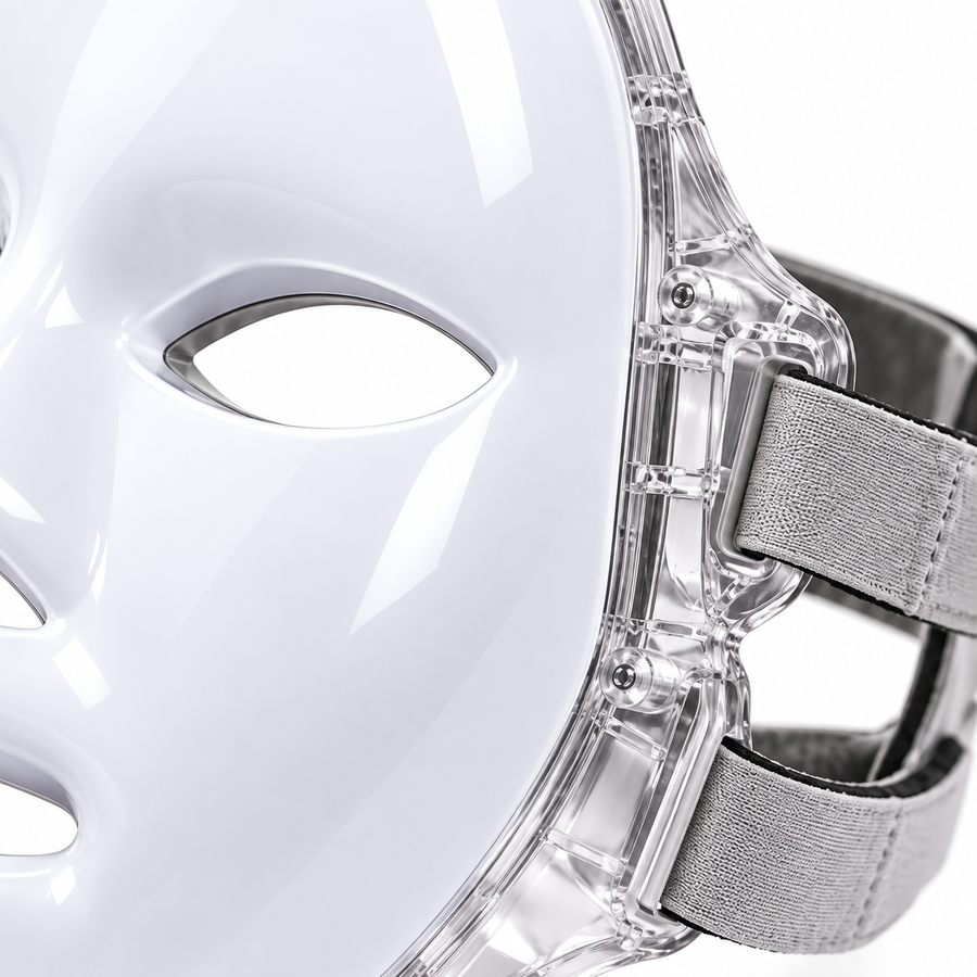 Close-up of the Red Light Therapy Mask showing its eye opening, clear frame and grey fastening straps