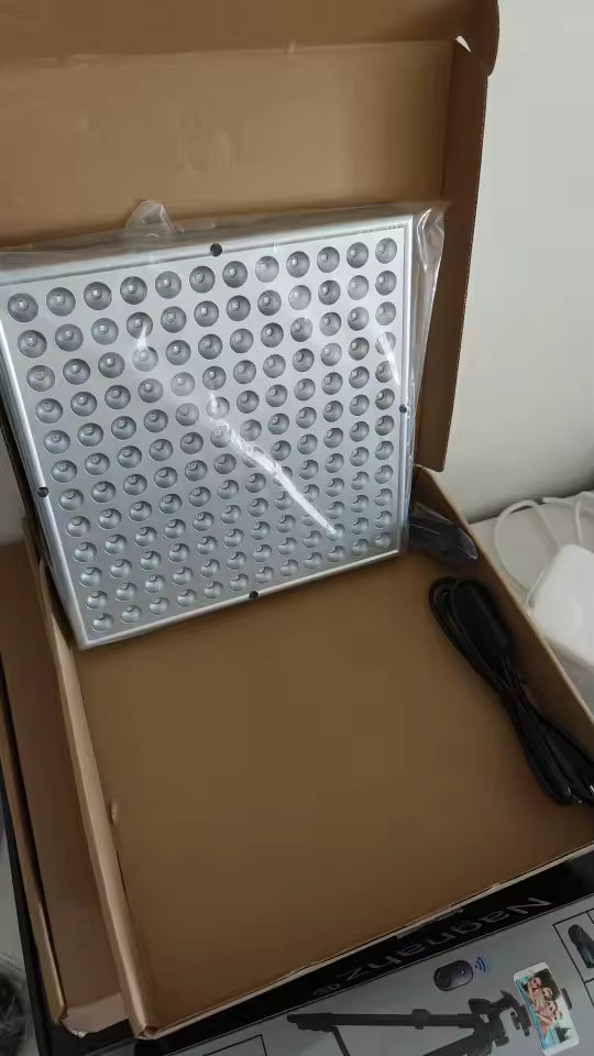 The compact panel photographed in its open packaging.