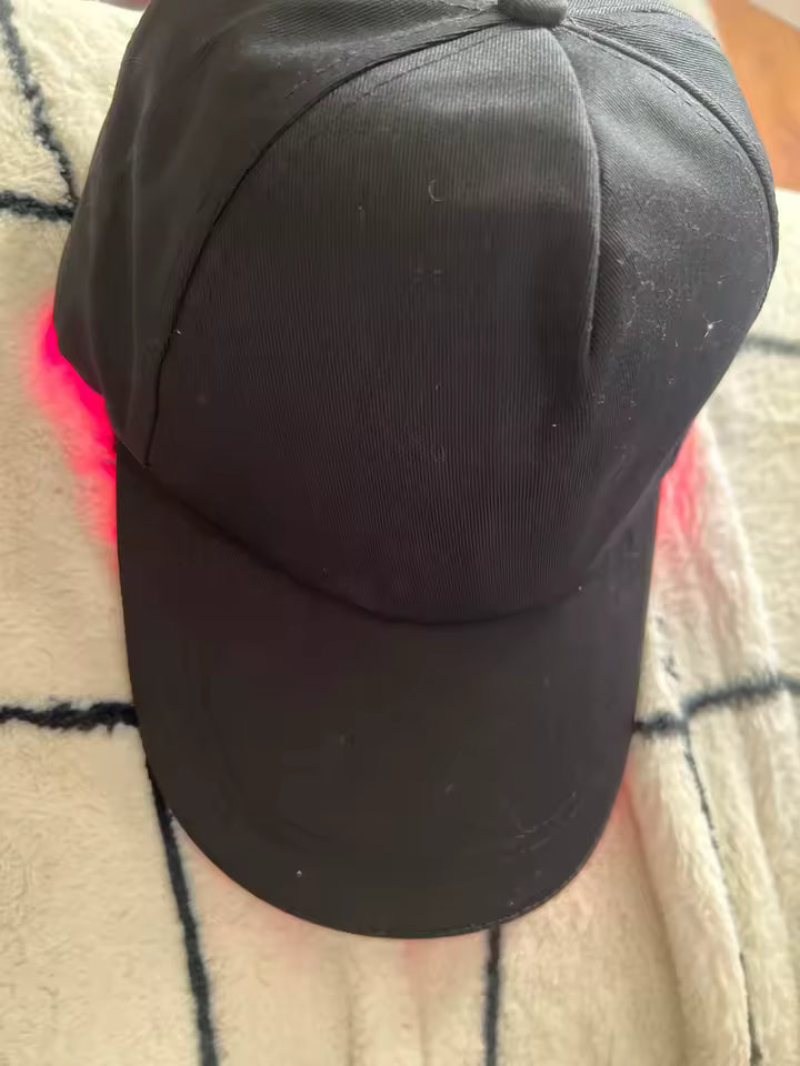 An exterior view of the black cap and its curved peak.